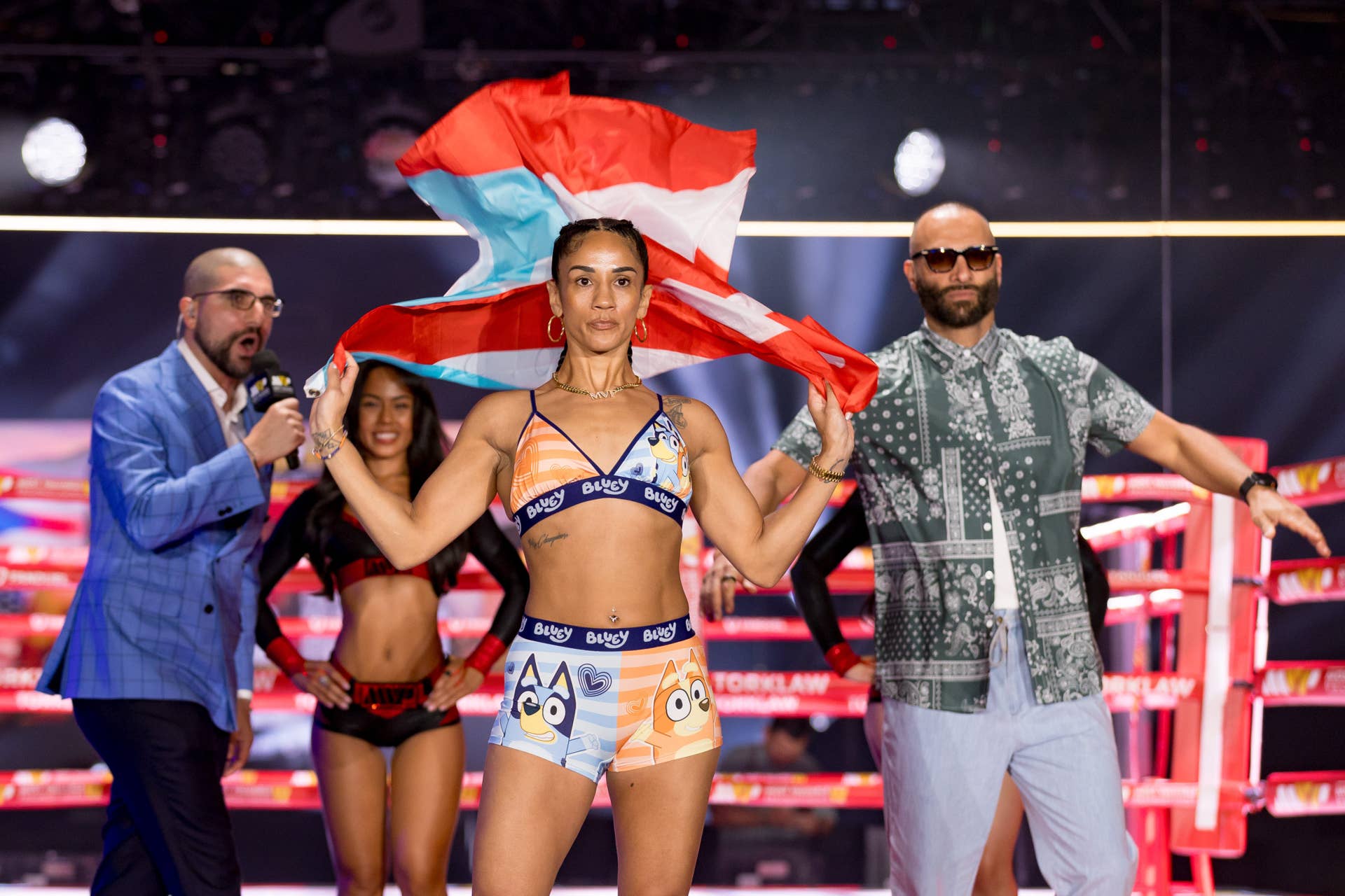 puerto-rican-boxer-amanda-serrano-poses-with-the-puerto-rican-flag-during-weigh-ins-friday-may-29-2026-at-the-el-paso-county